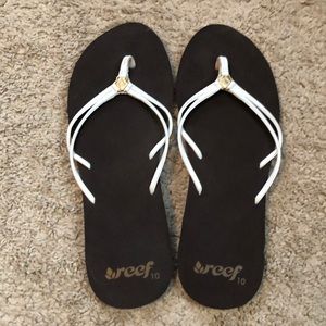 Dark brown and white reef flip flops